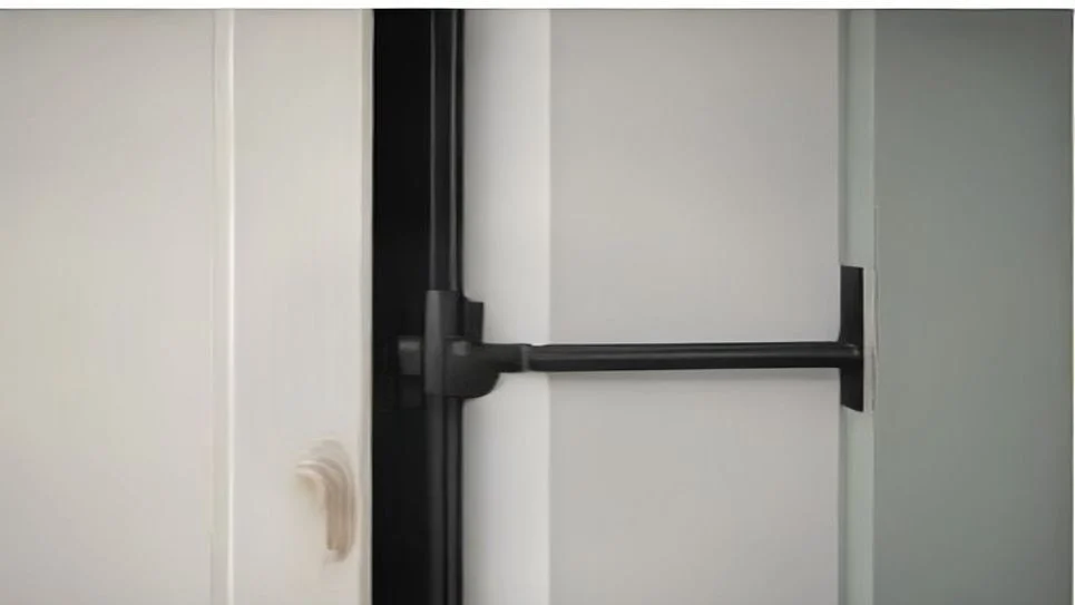 A draft stopper blocking cold air at a closed door